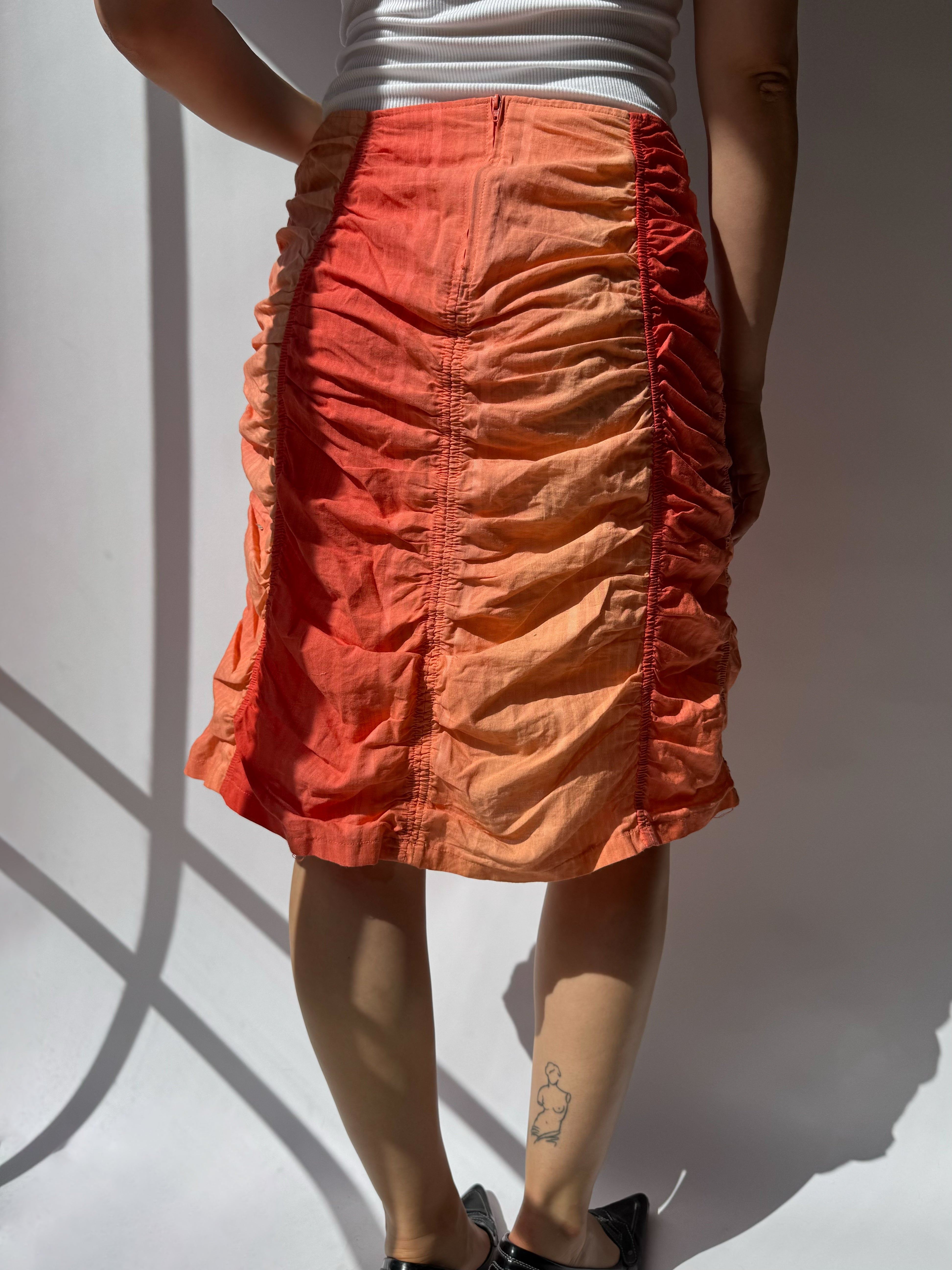 חצאית כיווצים כתומה (40)