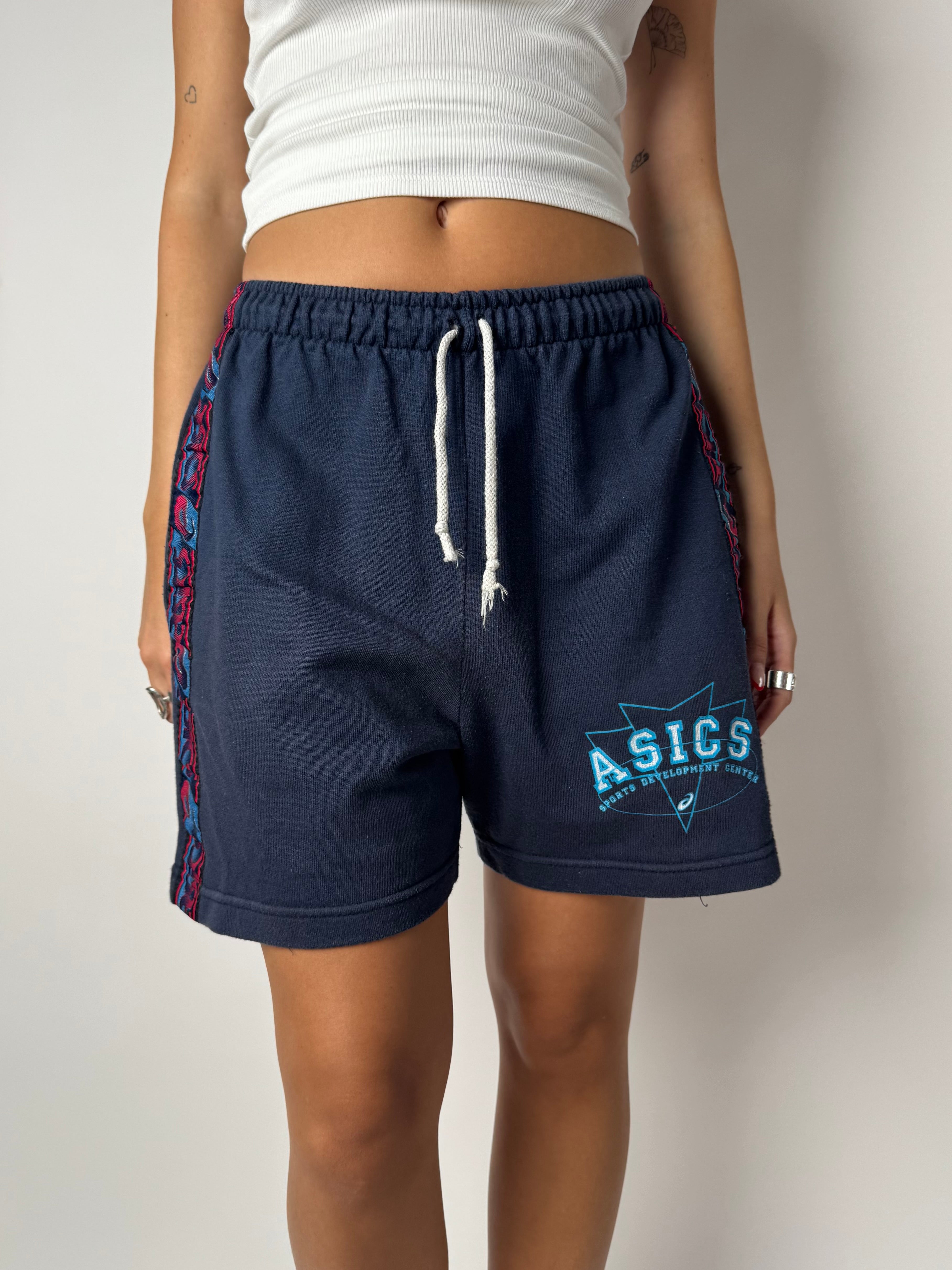 מכנסי טרנינג קצרים Asics (S-M)