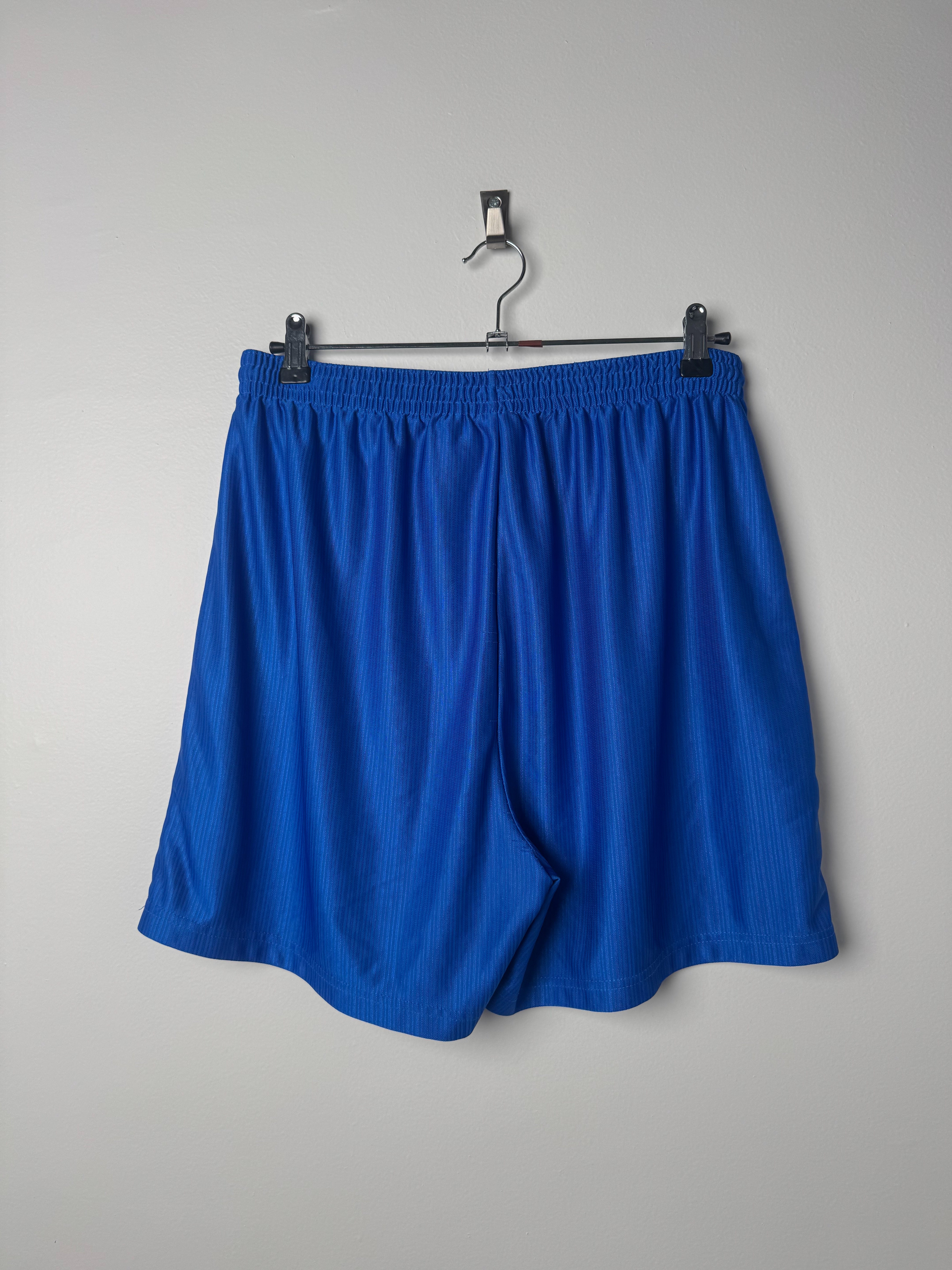 מכנסי ספורט כחולים קצרים Nike (L)