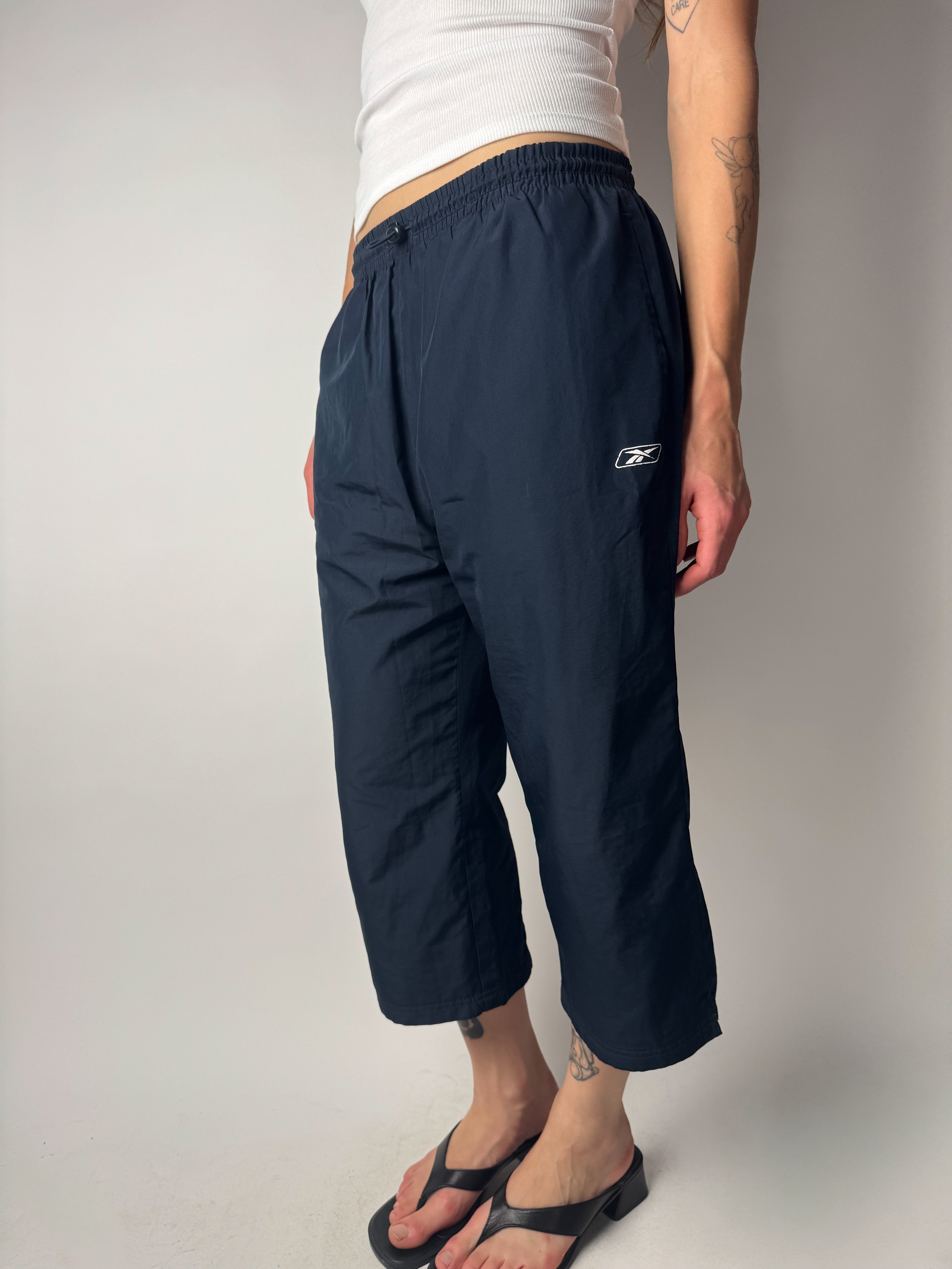 מכנסי ספורט קפרי Reebok (S)