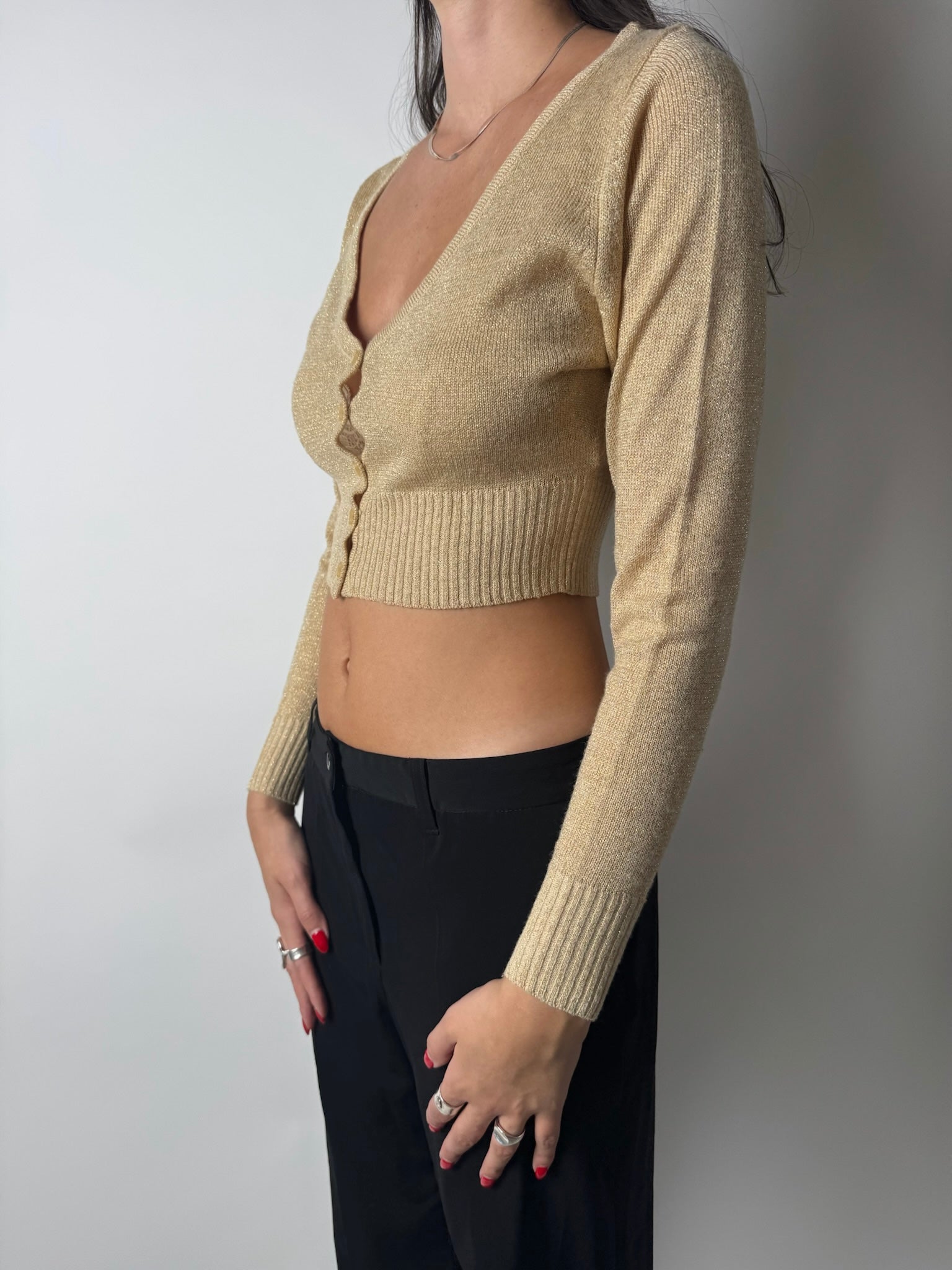 עליונית זהובה מנצנצת בגזרת קרופ (XS)