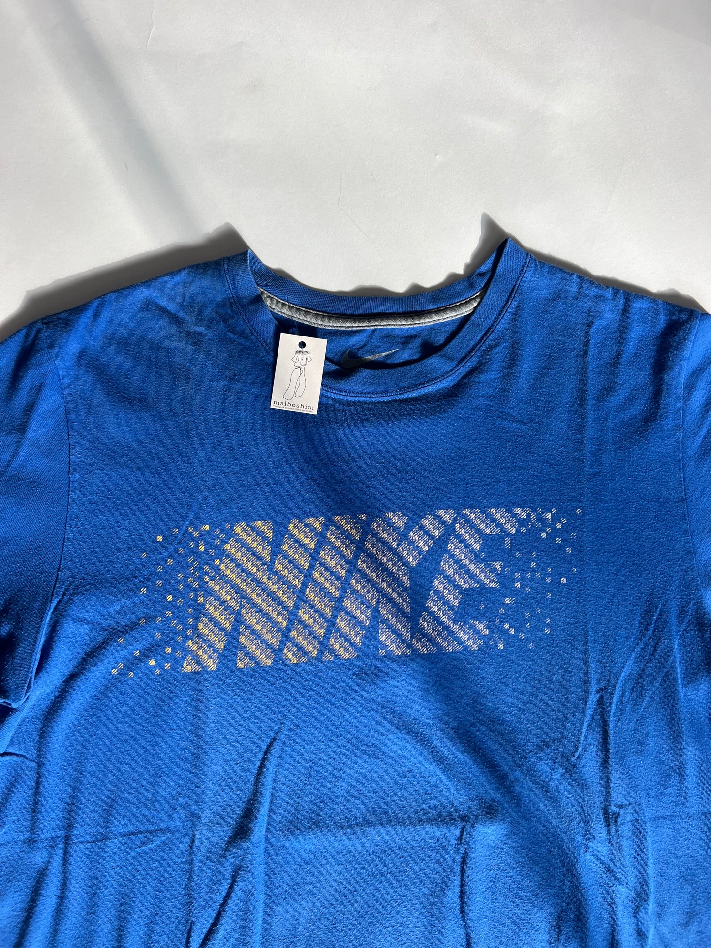 טי שרט כחולה עם לוגו Nike (M)