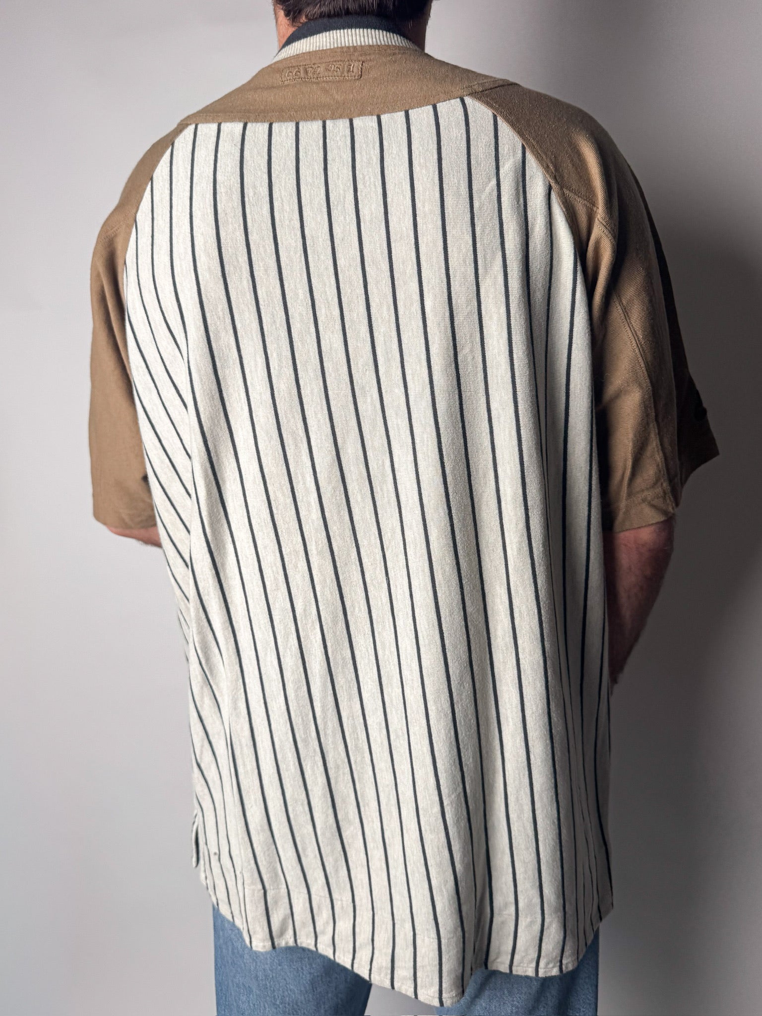 טי שירט מכופתרת פסים Nike (M)