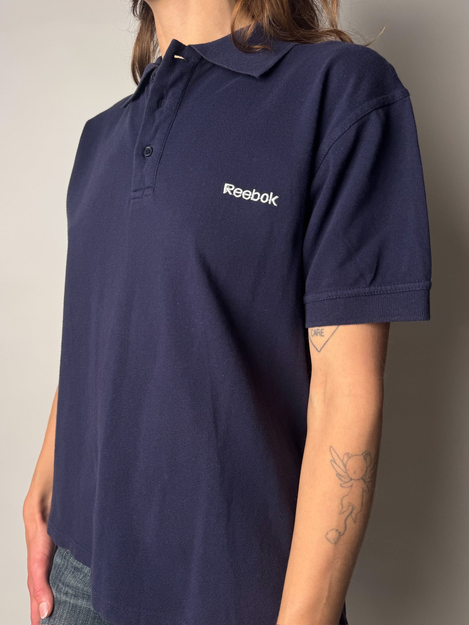 חולצת פולו נייבי Reebok (M)