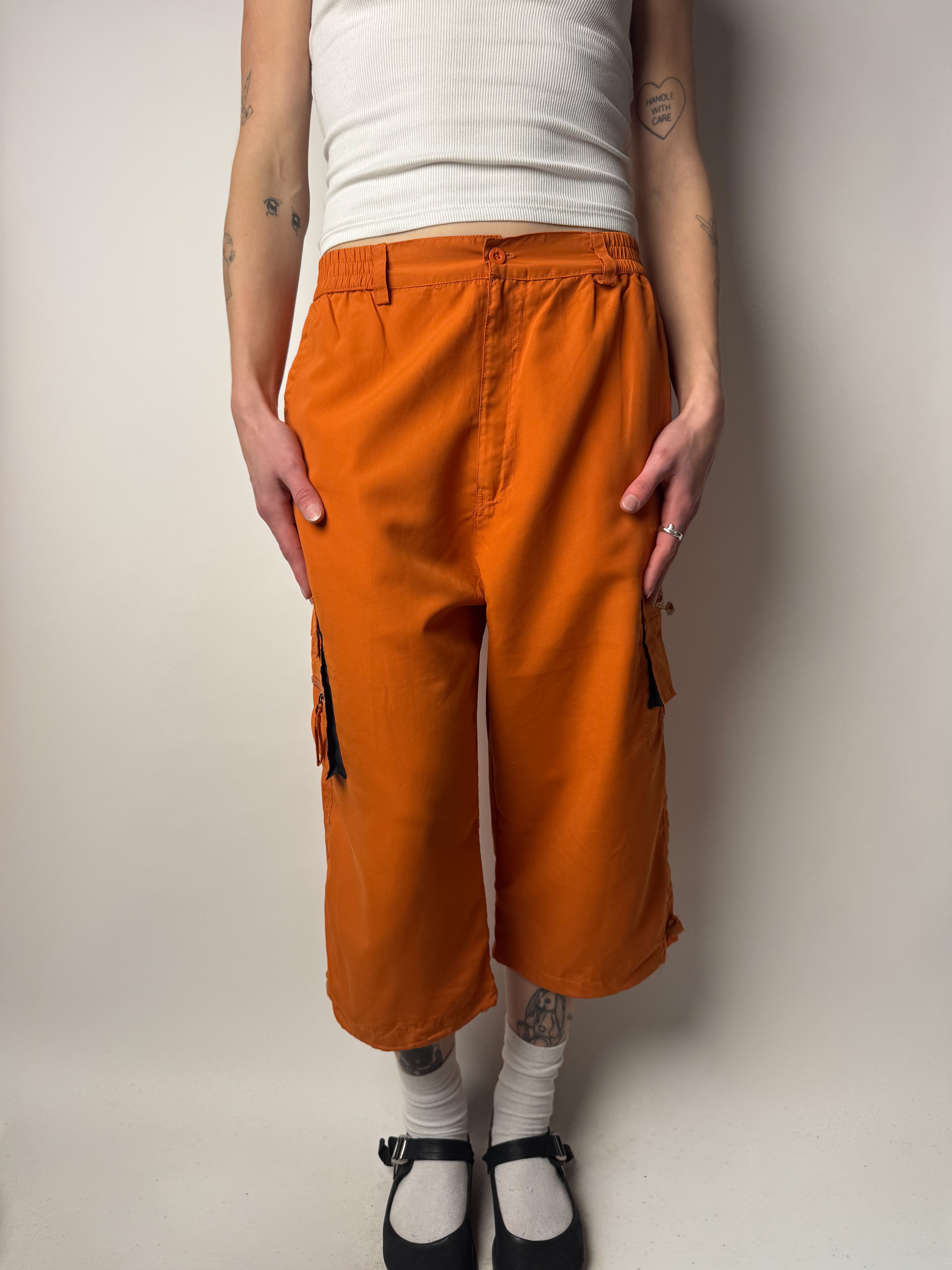 מכנסי דגמ״ח 3/4 כתומים (M)