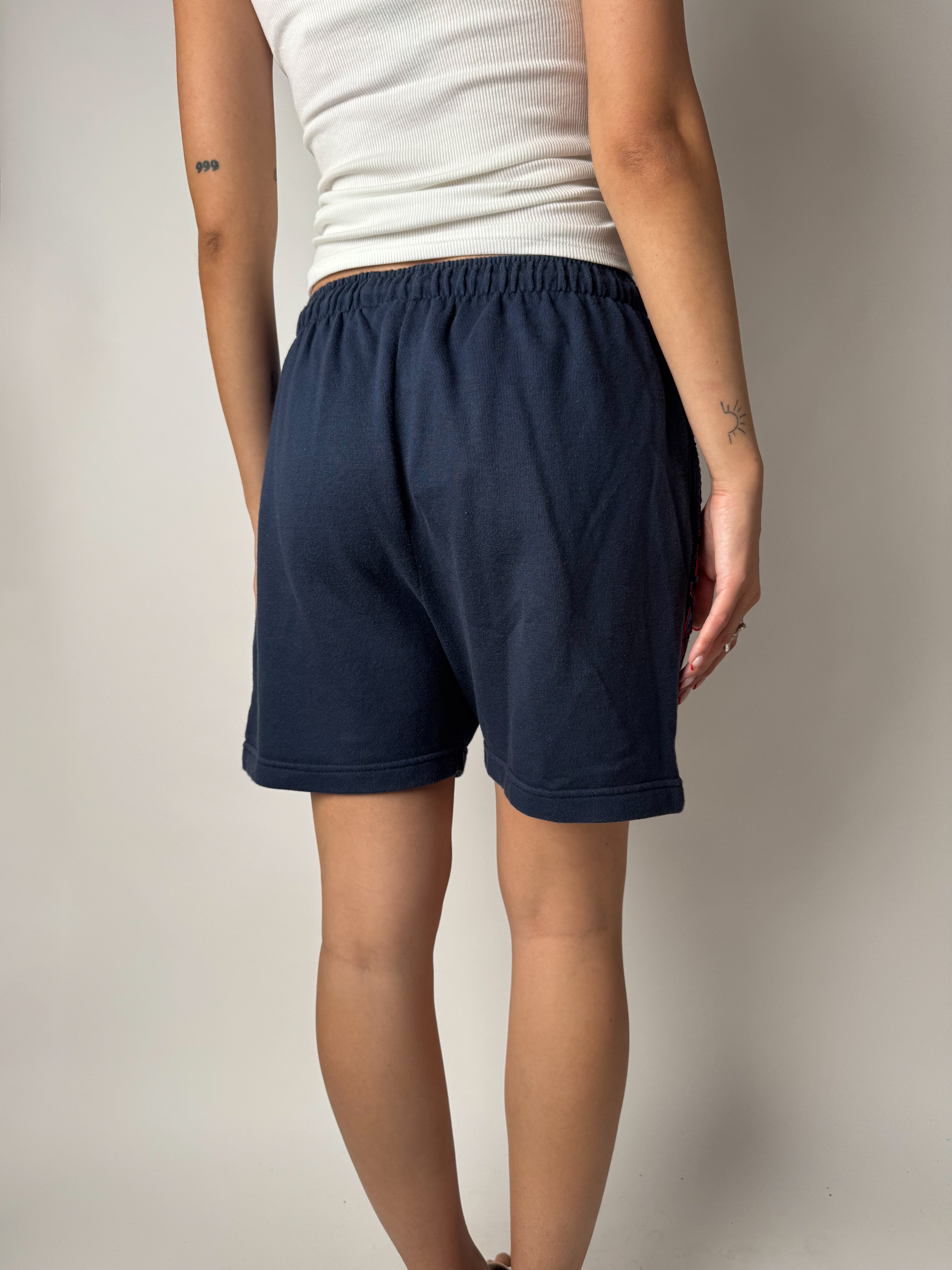 מכנסי טרנינג קצרים Asics (S-M)