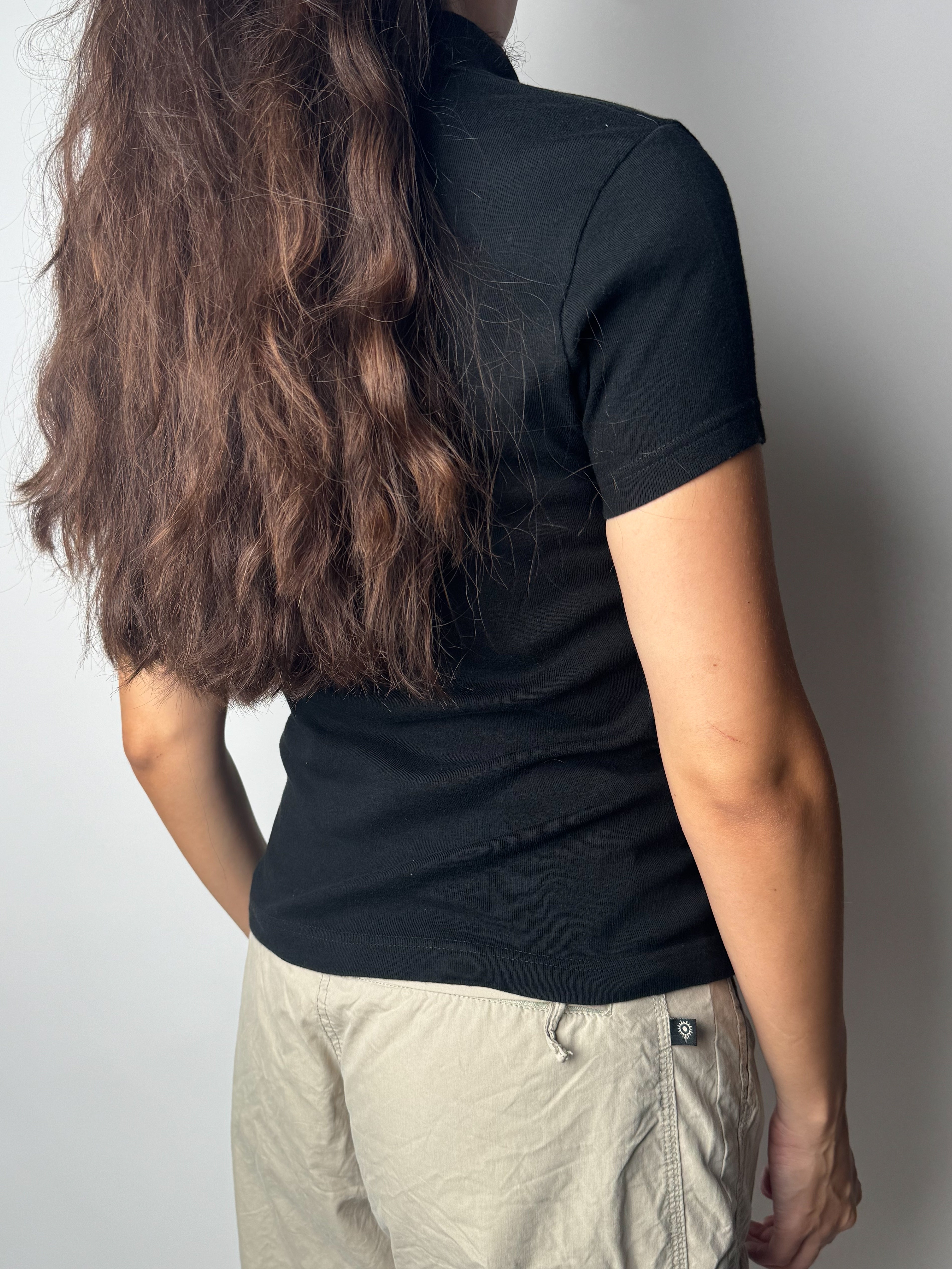 חולצת פולו שחורה Lacoste (M)